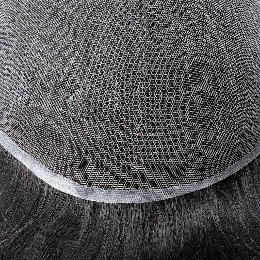 Close-up view of Swiss Lace hair system&